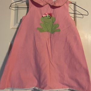 Pink and white gingham dress with frog appliqué.